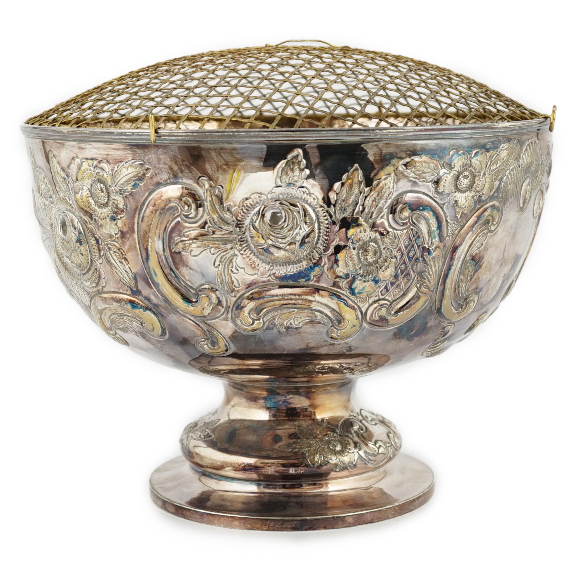 A large Edwardian repousse silver rose bowl, by Carrington & Co